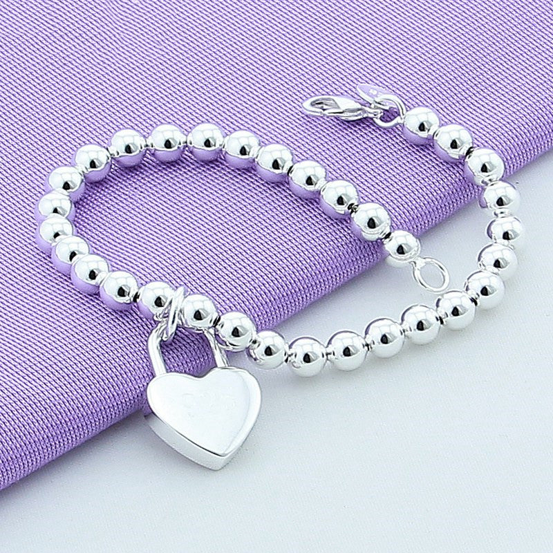 Bracciale con chiusura a cuore placcato argento 925