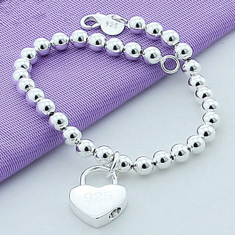 Bracciale con chiusura a cuore placcato argento 925